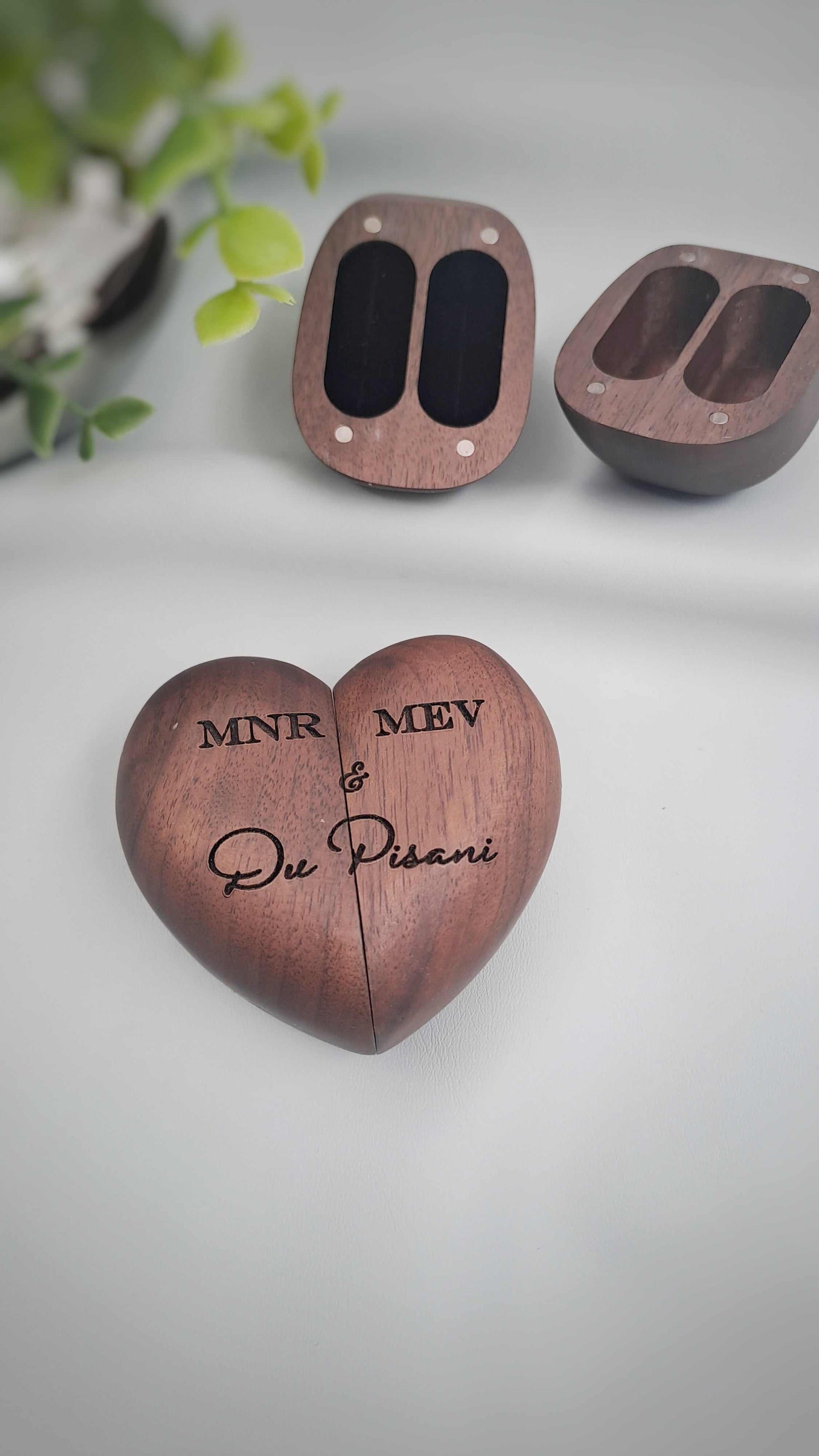 Heart shaped wooden wedding ring box with velvet interior and magnetic closure