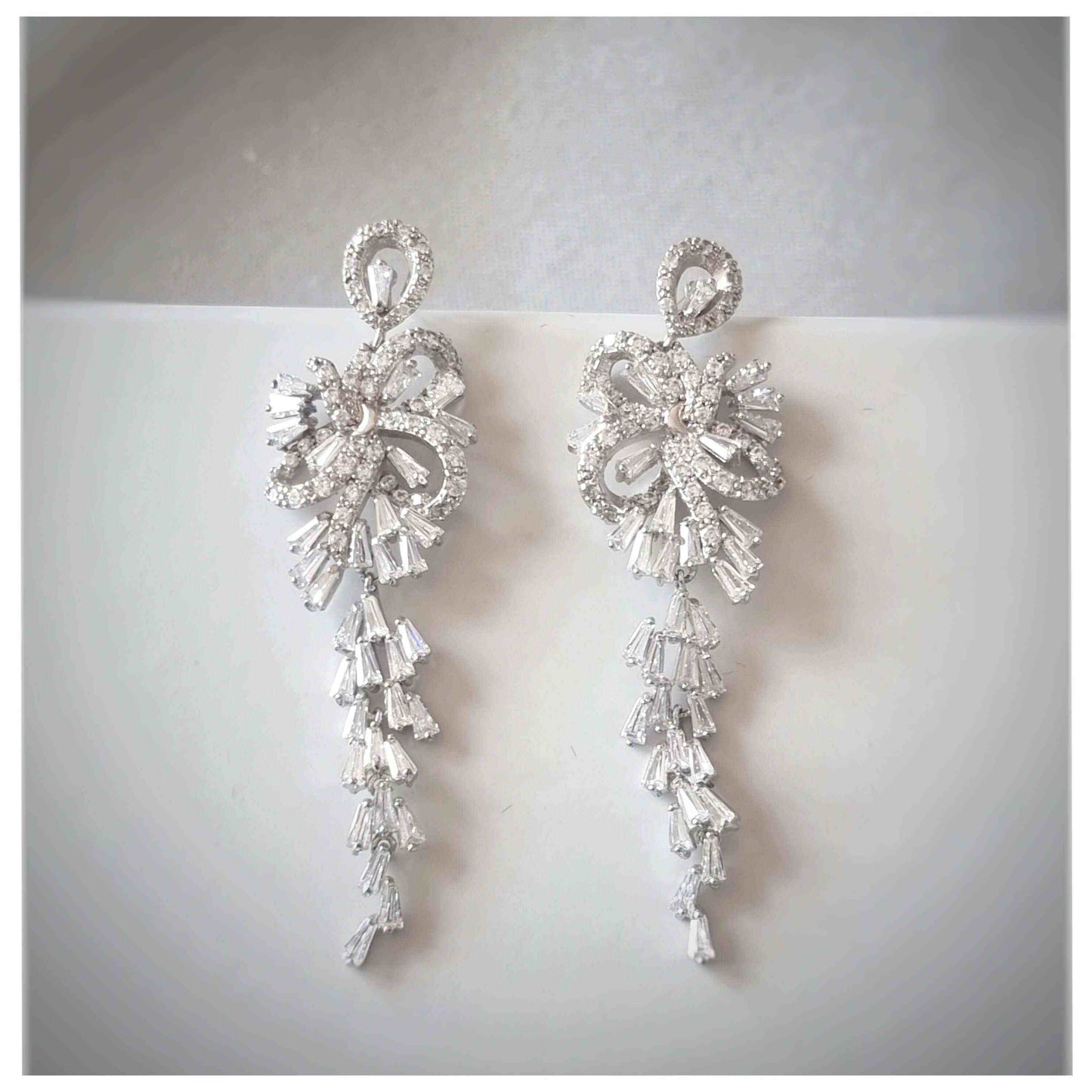Elegant zircon bridal drop earrings with intricate statement design for special occasions