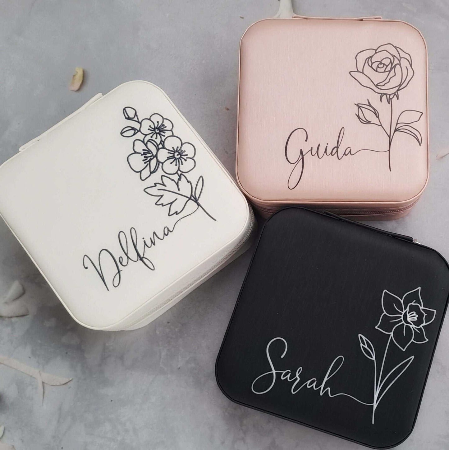 Personalised bridesmaid proposal jewellery box gift bundle with birth flower designs and names on white, pink, and black boxes