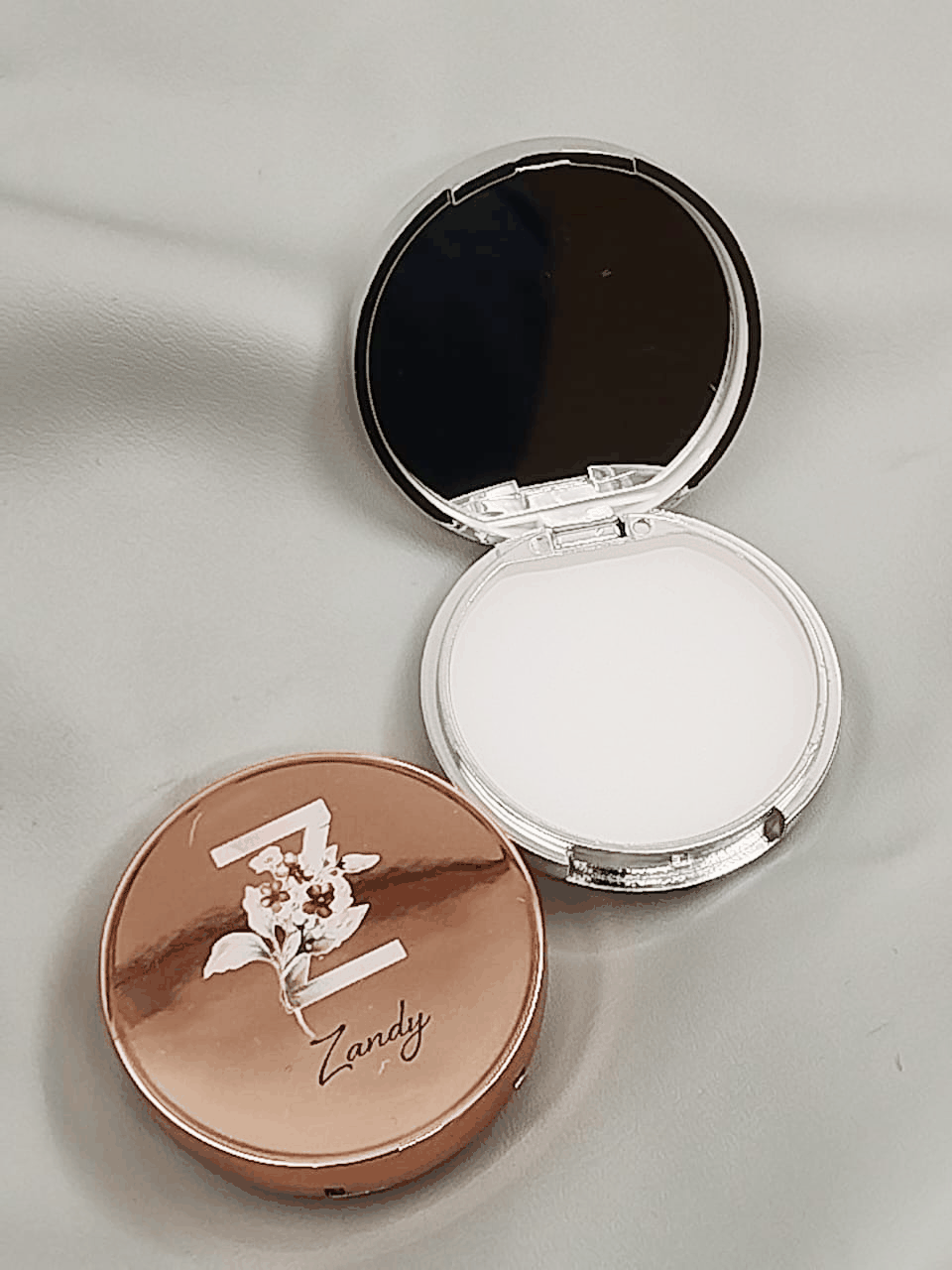 Personalised lip balm with floral initials and names, paired with matching mirror from Smooches Bridal and Gifts