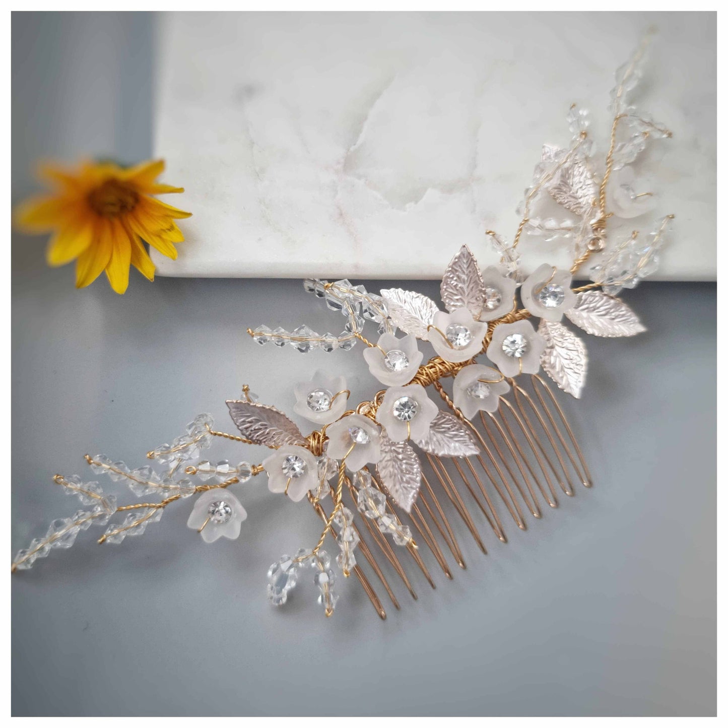 Rose gold Helga bridal hair comb with floral and leaf accents
