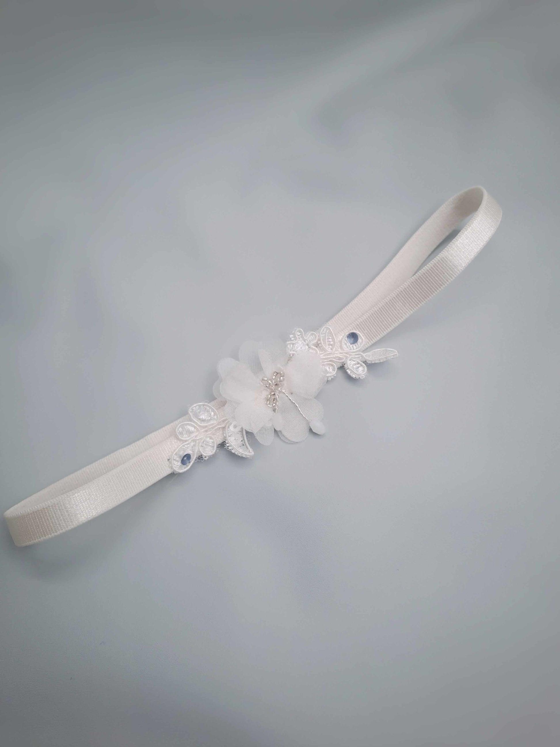 Ivory Marseilles Garter set with chiffon flower, faux pearls, and blue accents for weddings