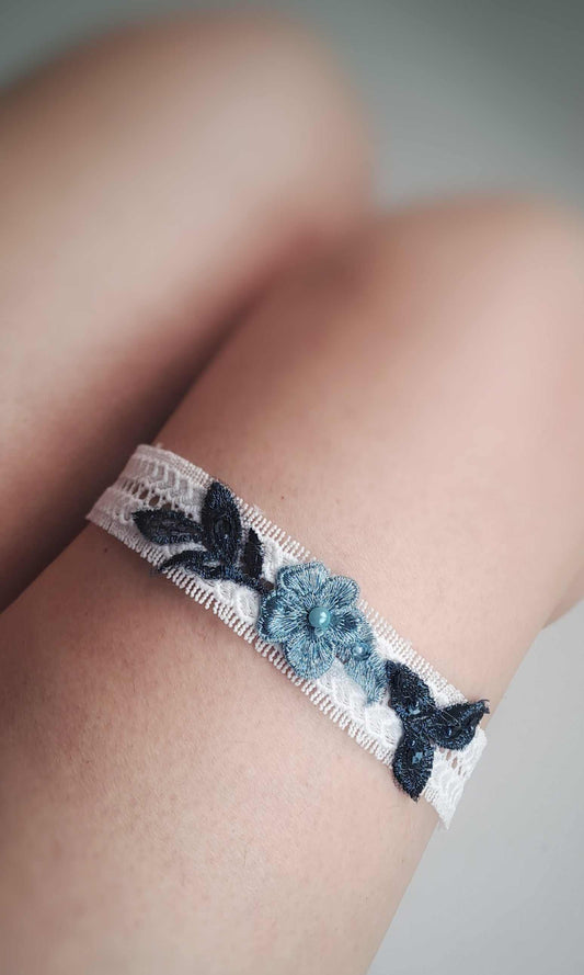 Lace wedding garter with light blue and navy lace motof