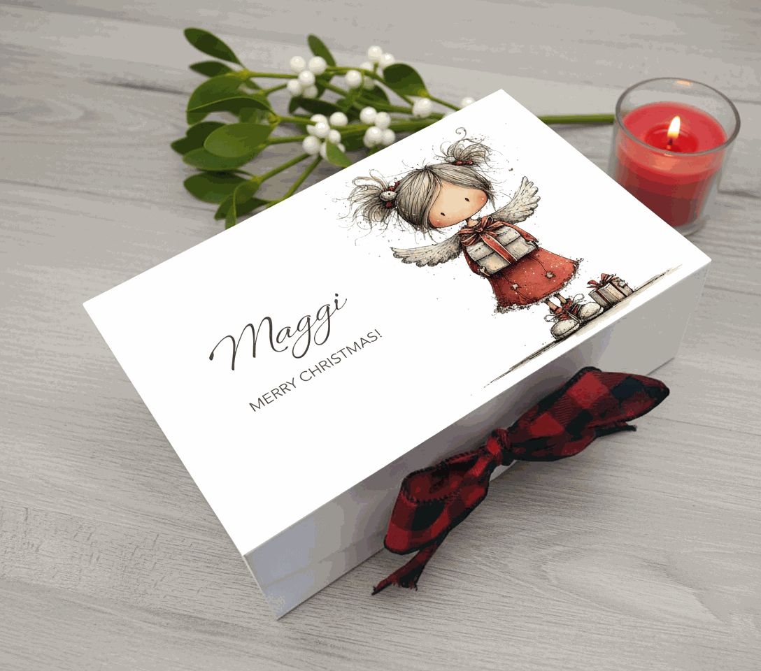Personalised christmas box with an angel illustration and 'Merry Christmas' text, tied with a red and black plaid ribbon.