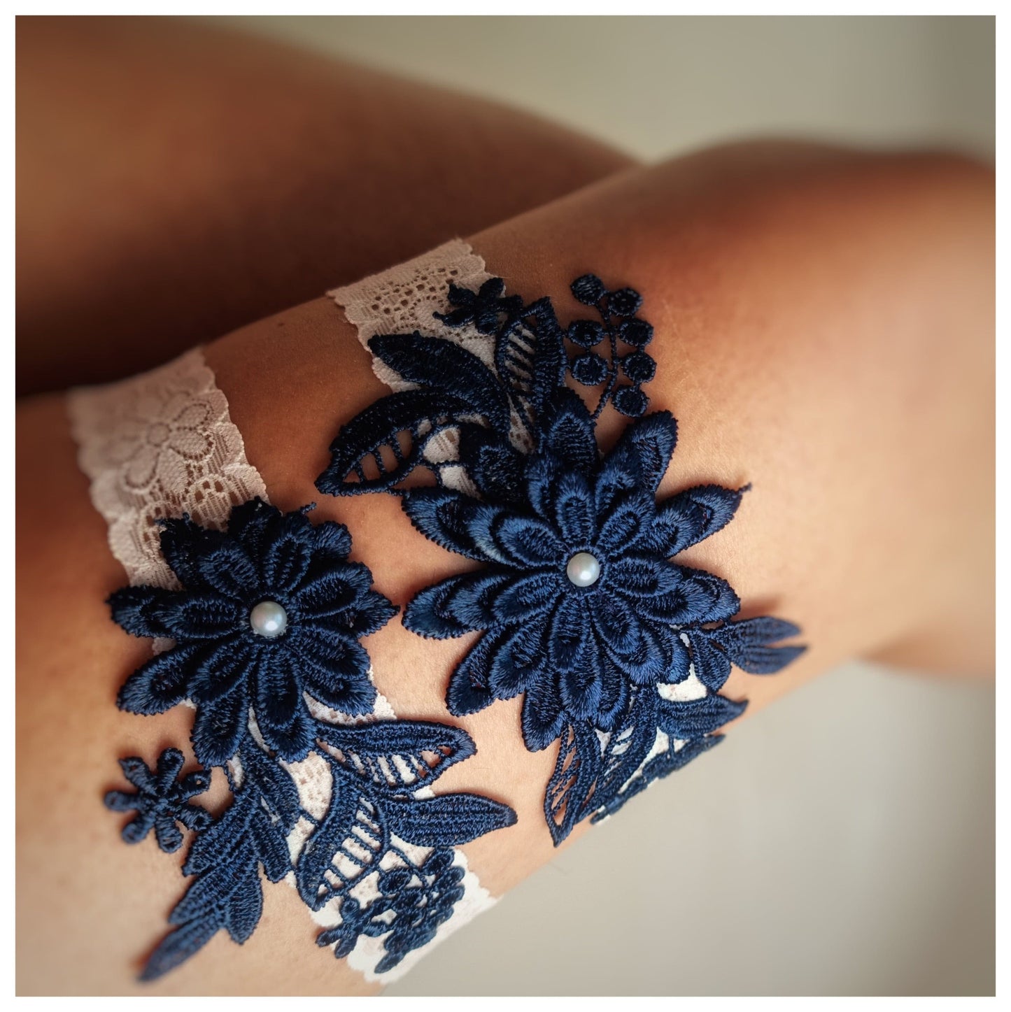 Navy blue floral lace wedding garter set